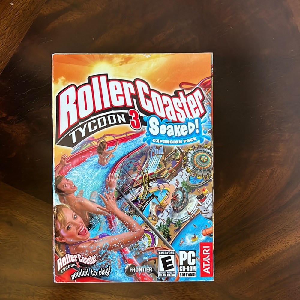 NIB Roller Coaster Tycoon 3 Soaked Expansion Pack PC CD-ROM Software